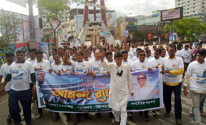 শিখন সরকারের নেতৃত্বে জেলা পূজা পরিষদের বর্নাঢ্য র‌্যালী